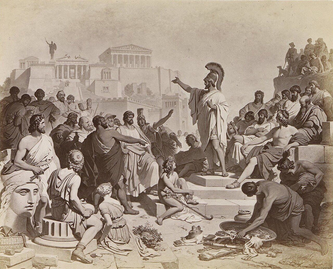 Pericles speaks from a platform to a crowd of Athenians, with the Acropolis behind him